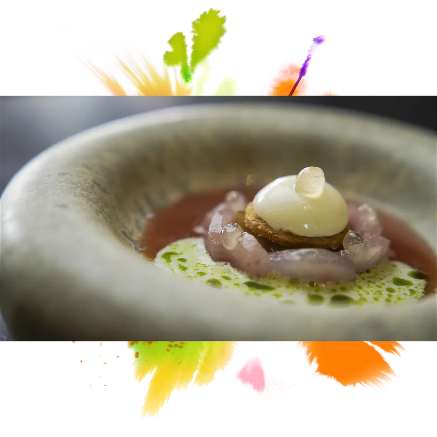 A dish at Restaurant Luwte in a stone bowl, framed by watercolour